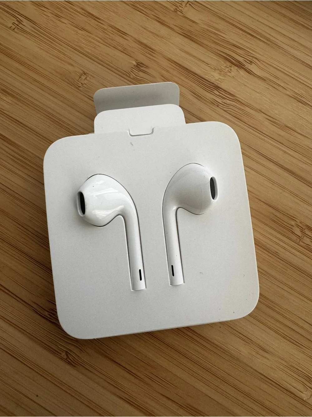 Brand new Apple white wired earbuds with lightning connector